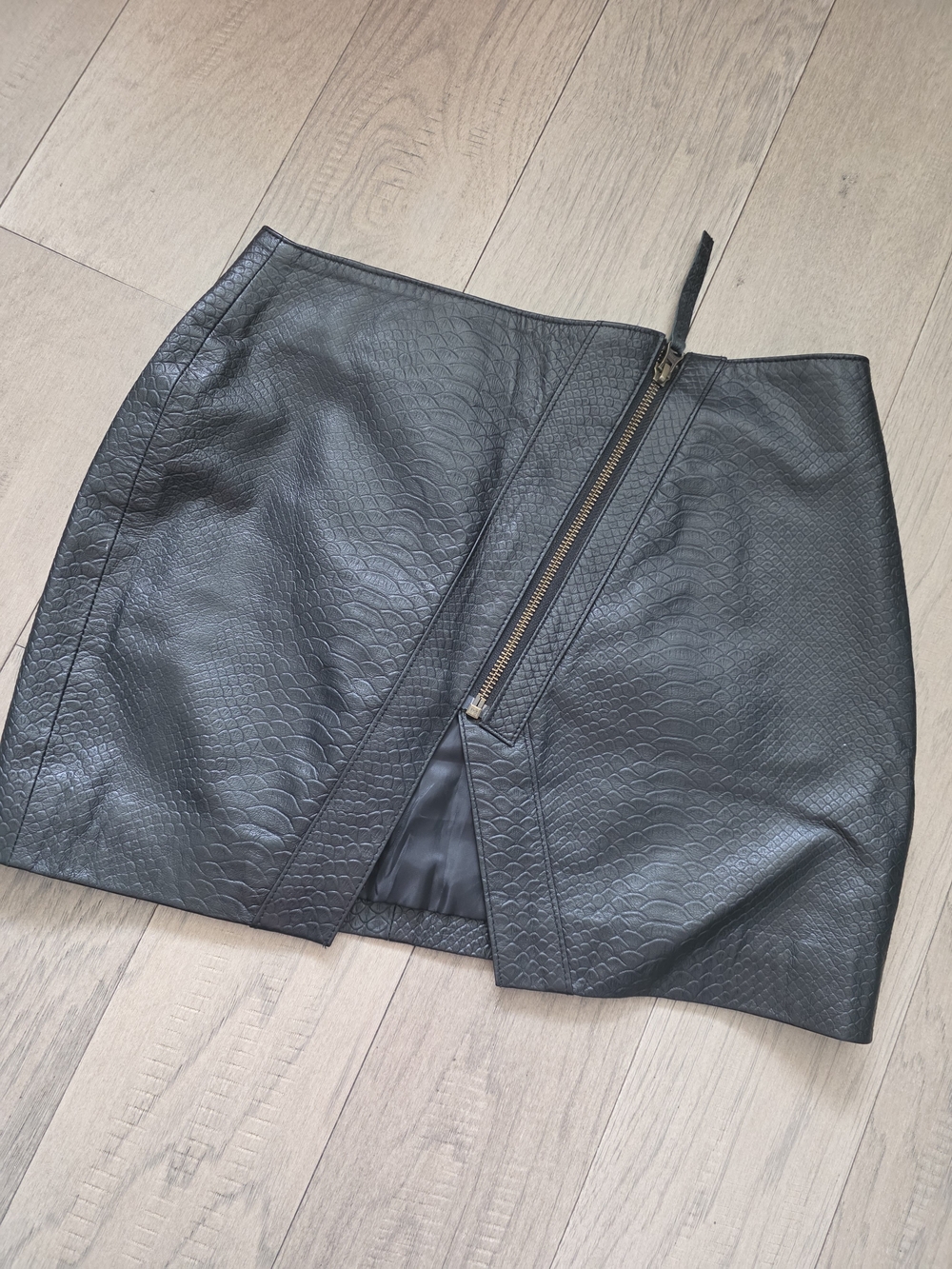 Black Faux Leather Mini Skirt with Asymmetrical Zip